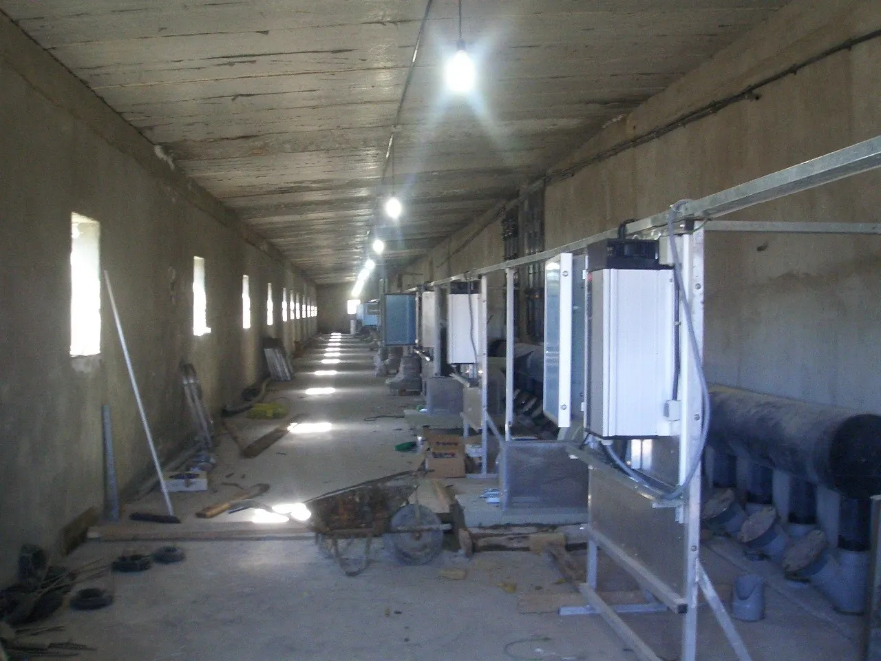 Enari growing racks — wide view across the hall