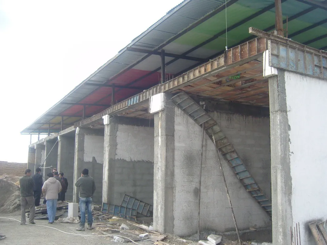 Enari growing racks — wide view across the hall